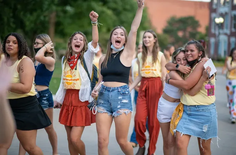 Students celebrating during Sorority Bid Night