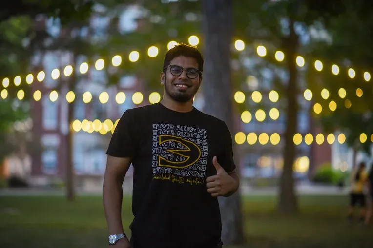 Emporia State University student giving thumbs up