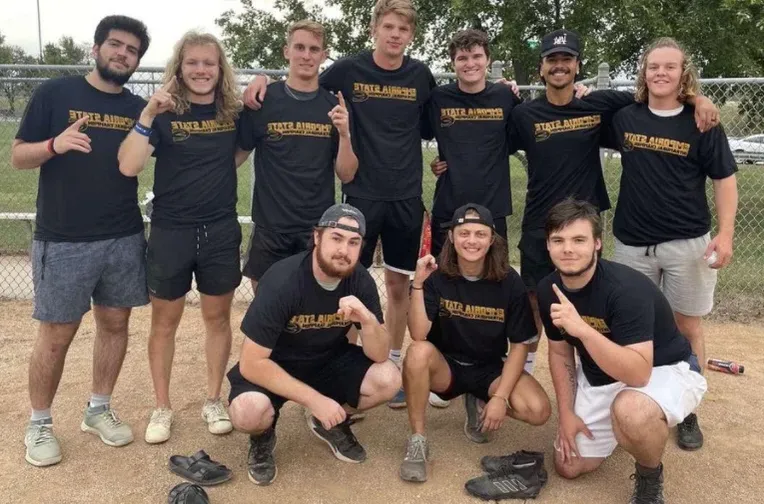 SigTau students posing for photos