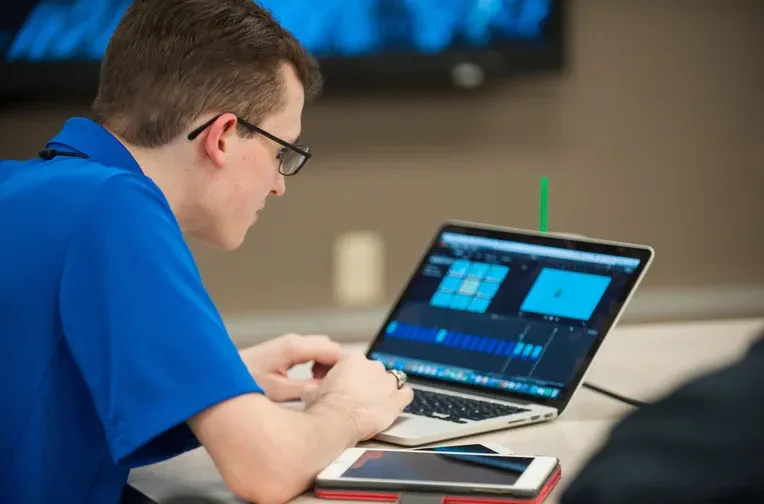 Emporia State student working on laptop